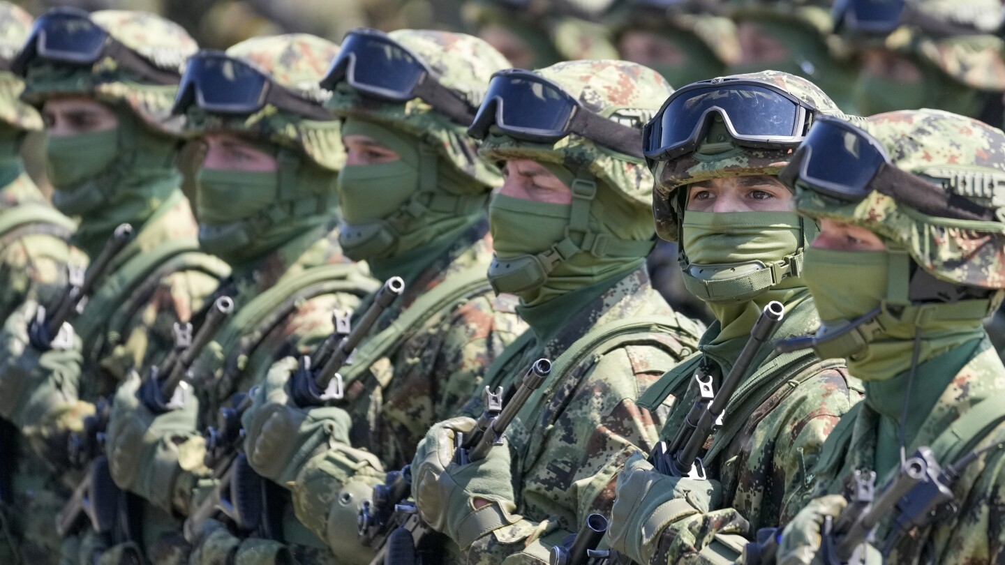 Serbia again threatens armed intervention in Kosovo as tension escalates | AP News