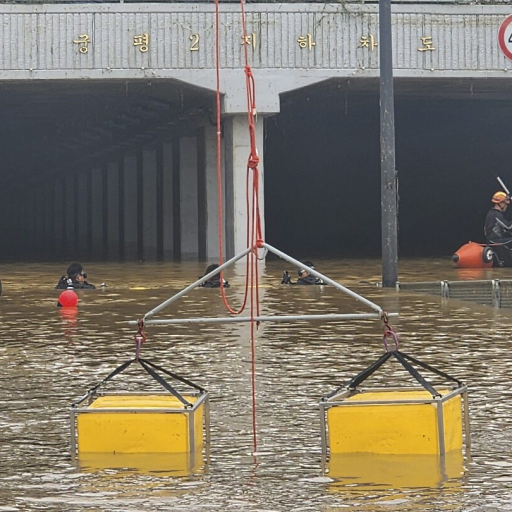 7 bodies pulled from flooded road tunnel in South Korea as rains cause flash floods and landslides | AP News