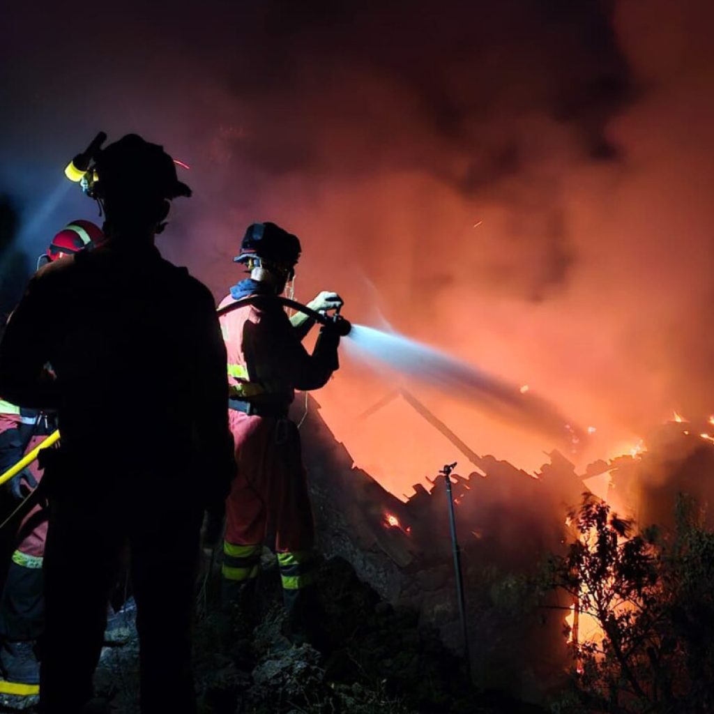 Better weather conditions help slow down La Palma wildfire in Spain’s Canary Islands | AP News