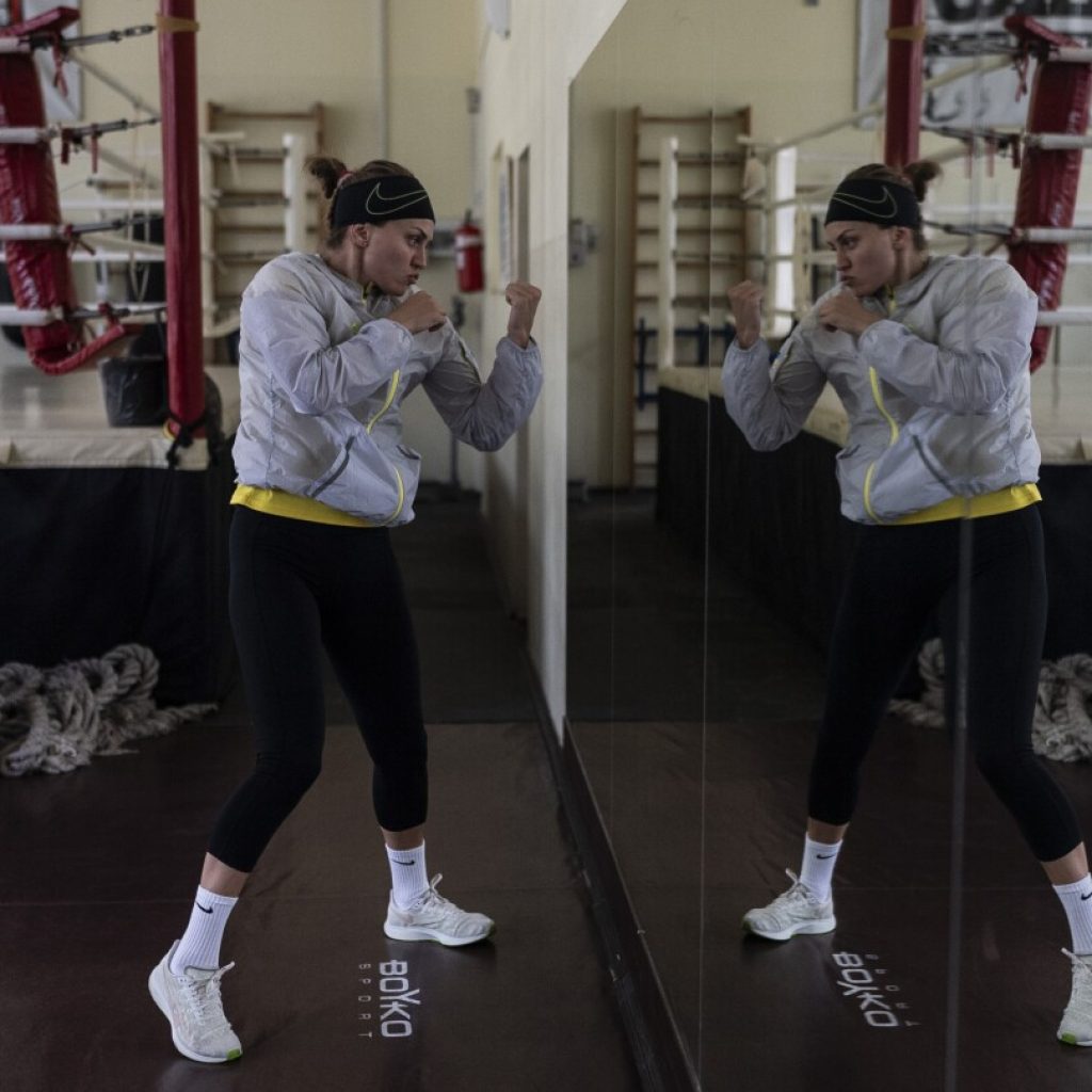 Ukrainian boxer fights through the challenges of war on her way to the Paris Olympics | AP News