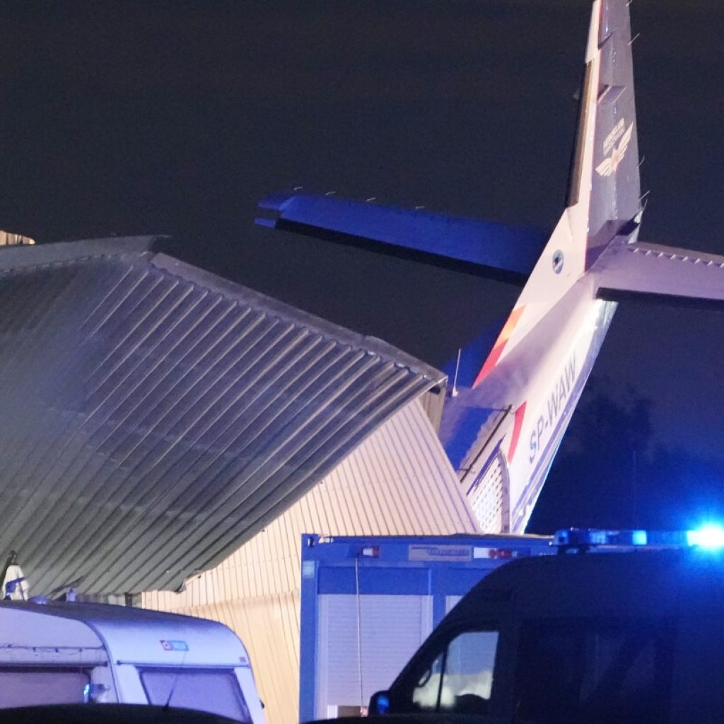 Plane hits hangar where people were sheltering in storm in Poland. Pilot and 4 others die and 8 hurt | AP News