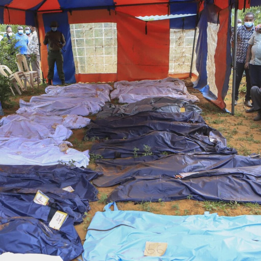 Kenya doomsday cult deaths top 400 as detectives exhume 12 more bodies, with the pastor in custody | AP News