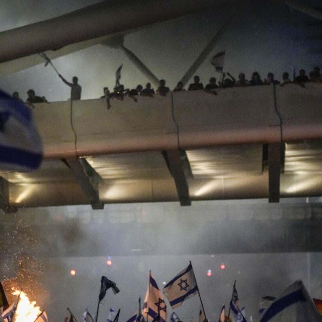 Thousands march from Tel Aviv to Jerusalem to protest Israeli government’s judicial overhaul plan | AP News