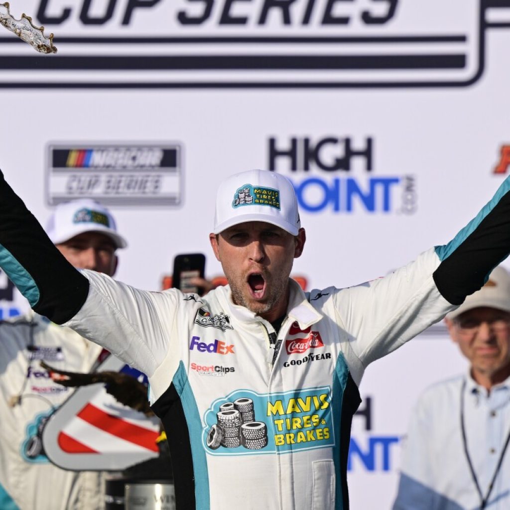 Denny Hamlin gets his record 7th victory at Pocono and 50th of his NASCAR Cup Series career | AP News