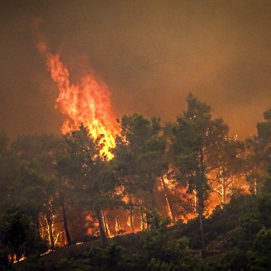 New evacuations ordered in Greece as high winds and heat fuel wildfires | AP News