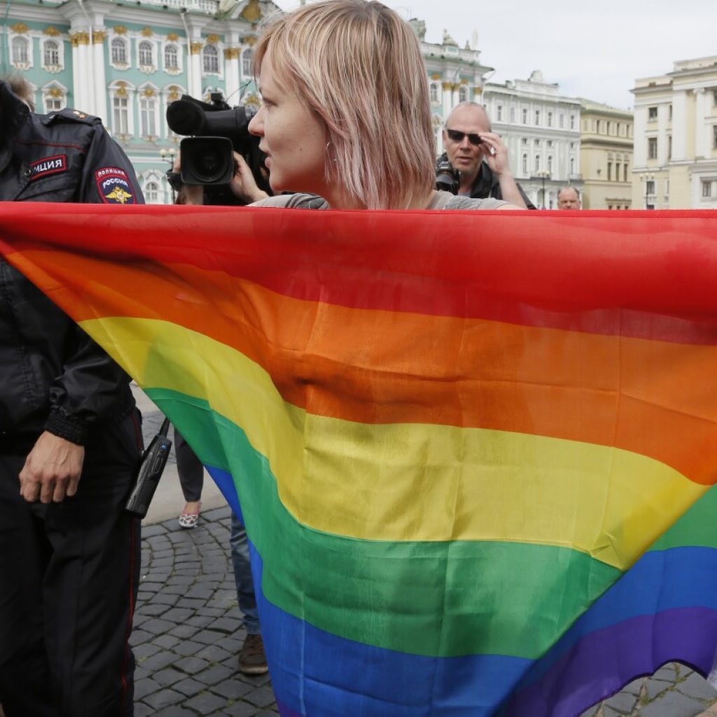 Russian president signs legislation marking the final step outlawing gender-affirming procedures | AP News