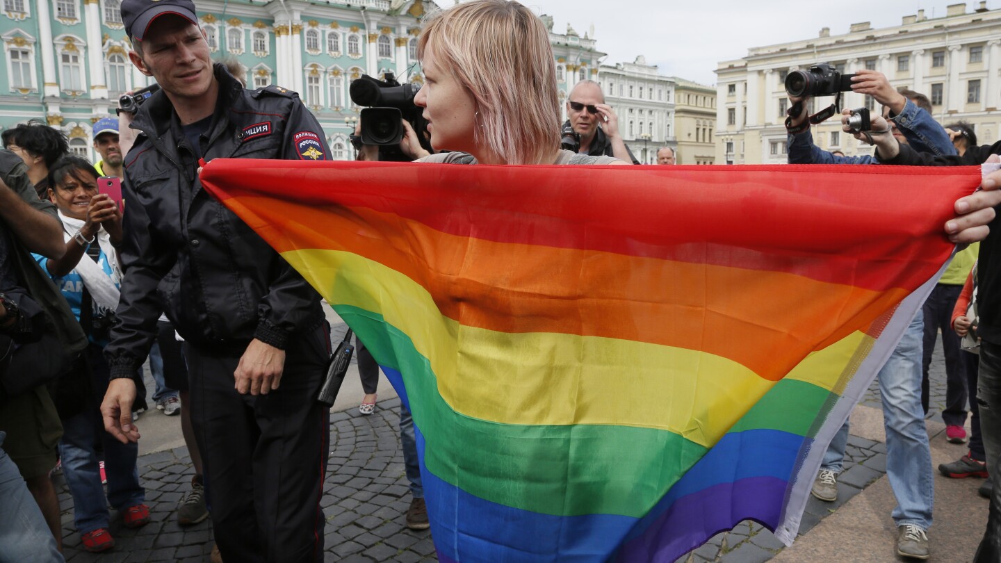 Russian president signs legislation marking the final step outlawing gender-affirming procedures | AP News