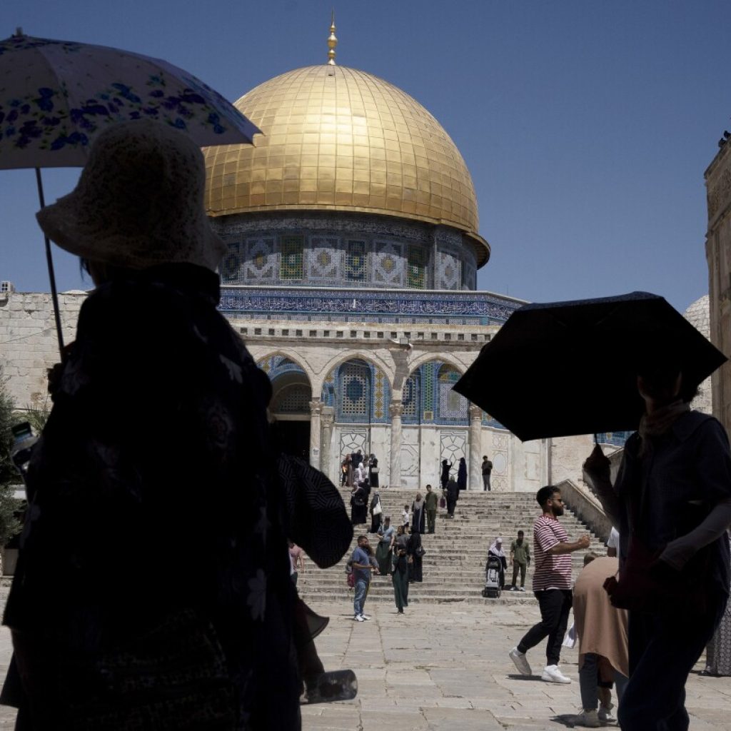 Army fire kills a 14-year-old, Palestinians say, as an Israeli minister visits flashpoint mosque | AP News