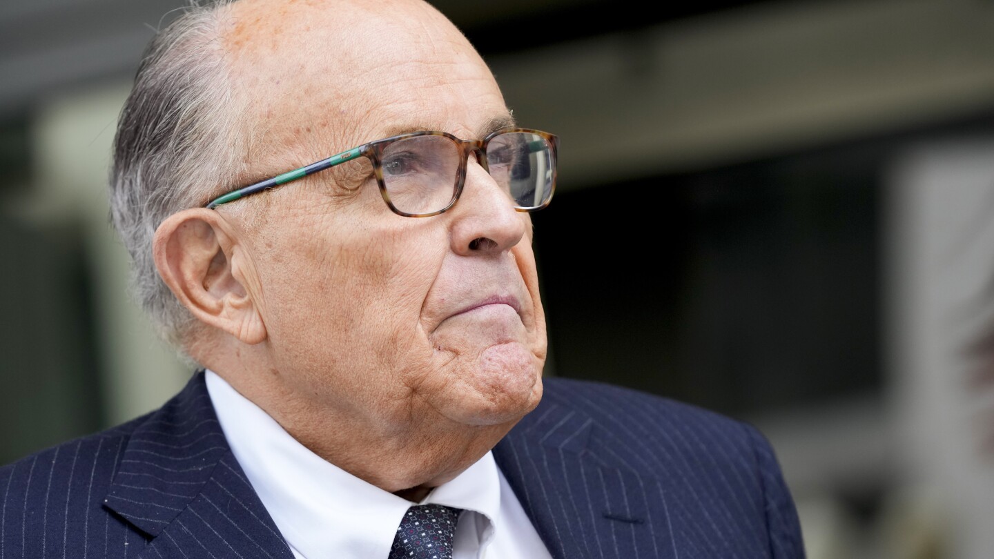 Giuliani concedes he made public comments falsely claiming Georgia election workers committed fraud | AP News