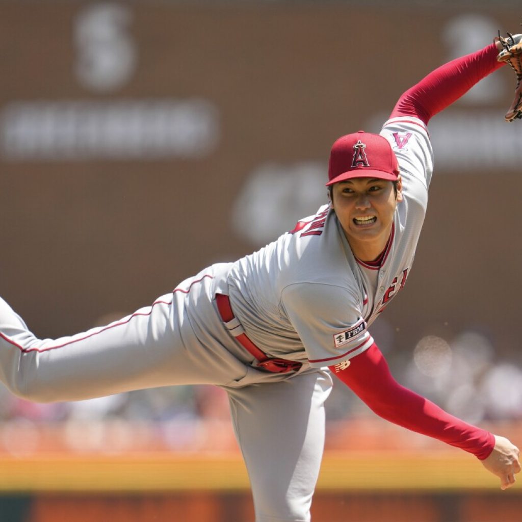 The Angels said they won’t trade Shohei Ohtani, and he celebrated by throwing a 1-hitter | AP News