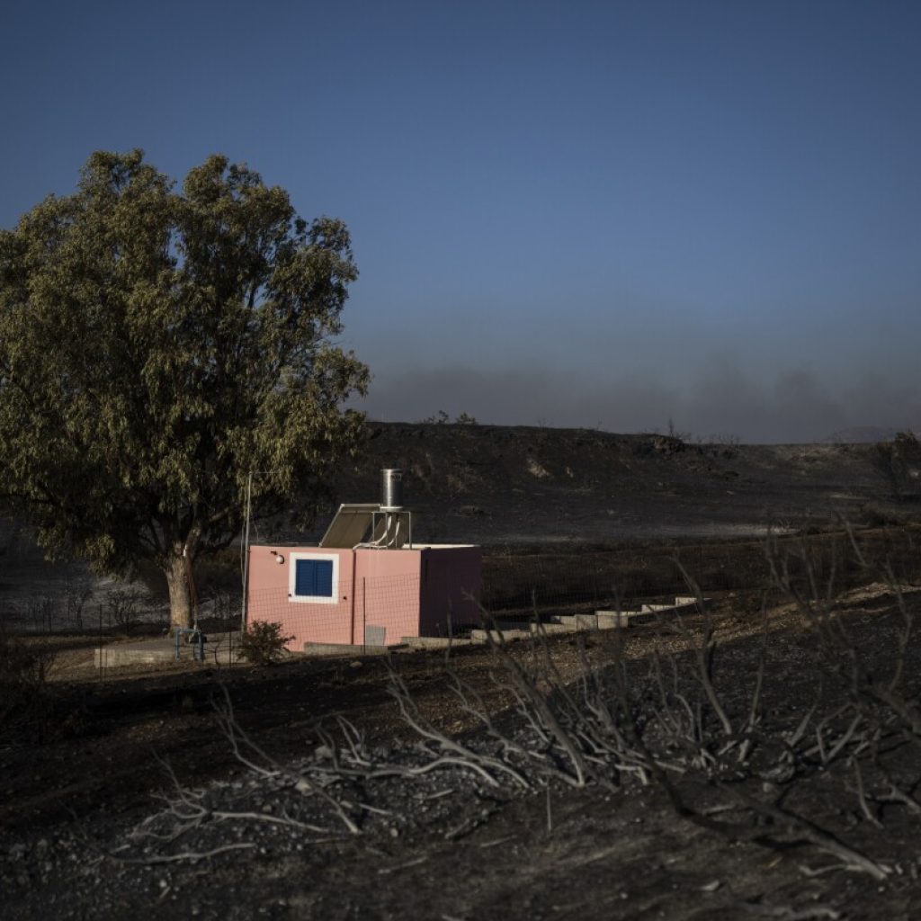 Exclusion zone set up around Greek military base after wildfires trigger powerful explosions | AP News