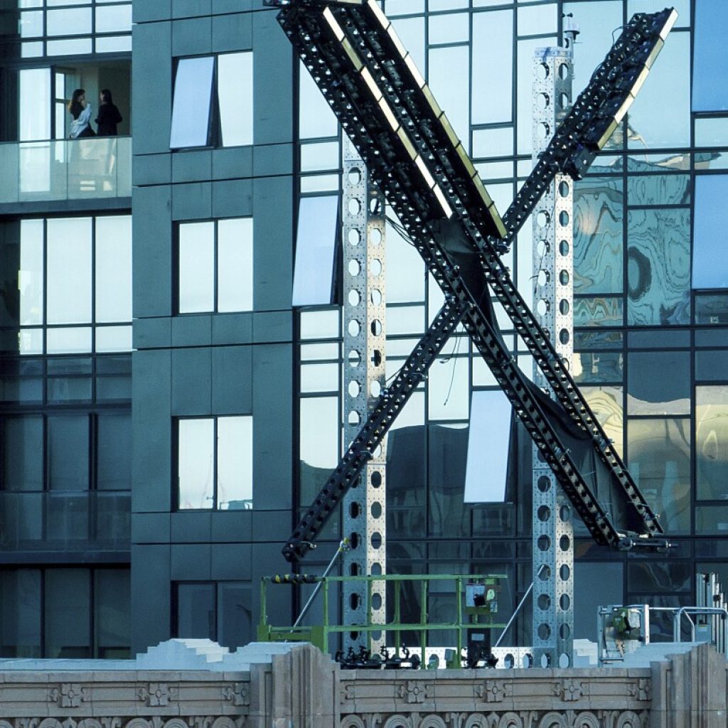 Brightly flashing ‘X’ sign removed from the San Francisco building that was Twitter’s headquarters | AP News