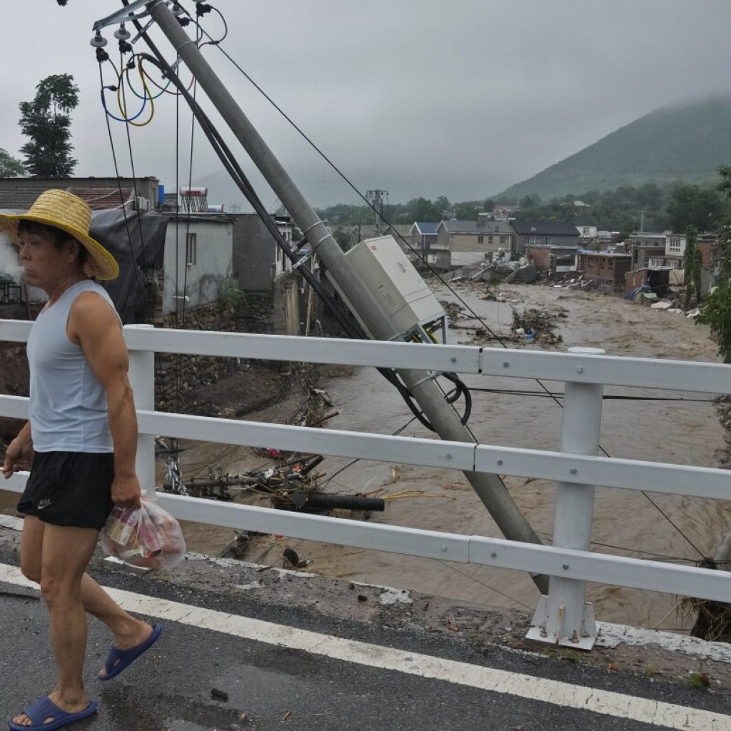 11 dead and 27 missing in flooding around Beijing after days of rain, Chinese state media report | AP News