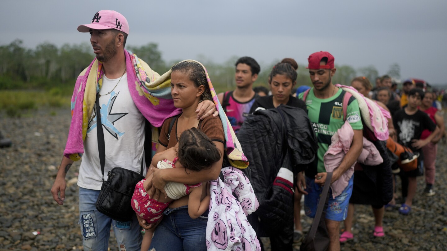 Nearly 250,000 migrants crossed Panama’s Darien Gap so far this year, more than in all of 2022 | AP News