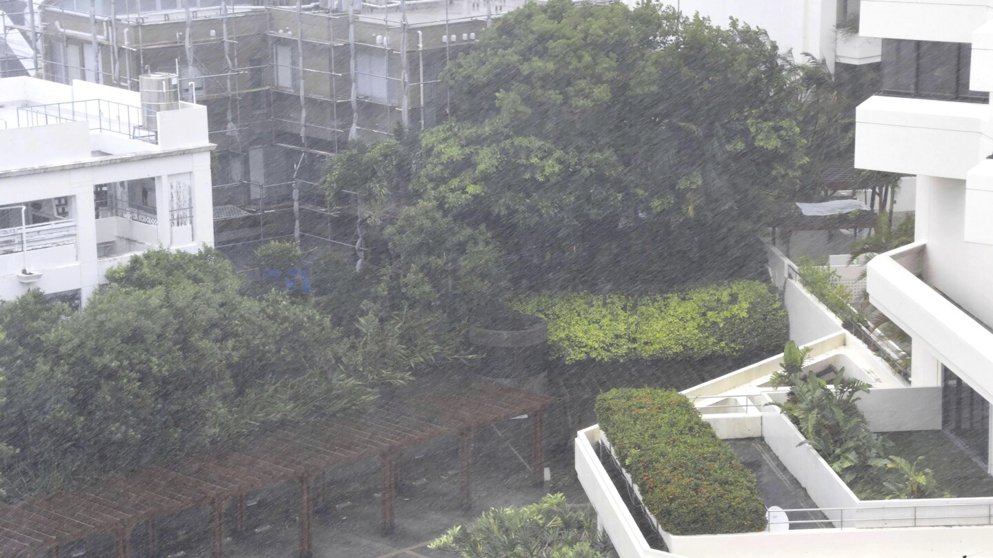 A powerful typhoon pounds Japan’s Okinawa injuring people while making its way toward mainland China | AP News