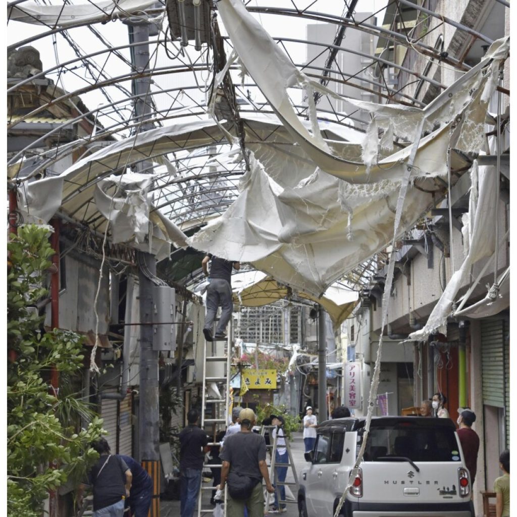 Typhoon Khanun forecast to turn back to Japanese islands where it already left damage and injuries | AP News