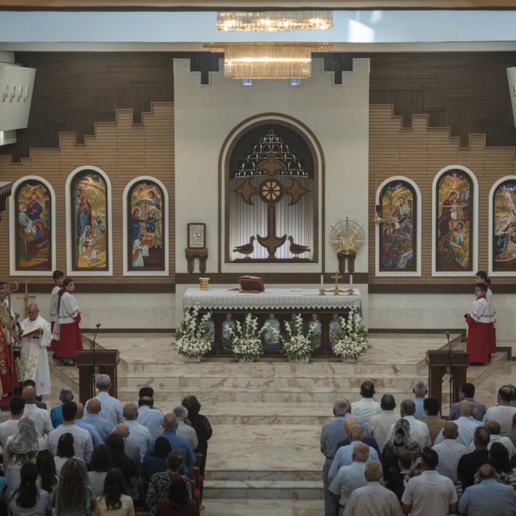 A feud between a patriarch and a militia leader adds to the woes of Iraqi Christians | AP News