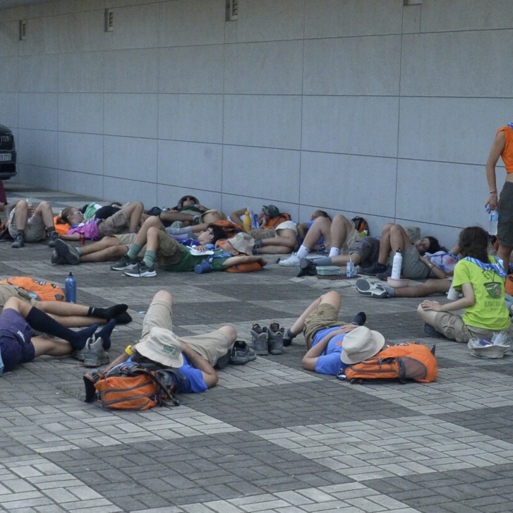 South Korea presses on with World Scout Jamboree as heat forces thousands to leave early | AP News