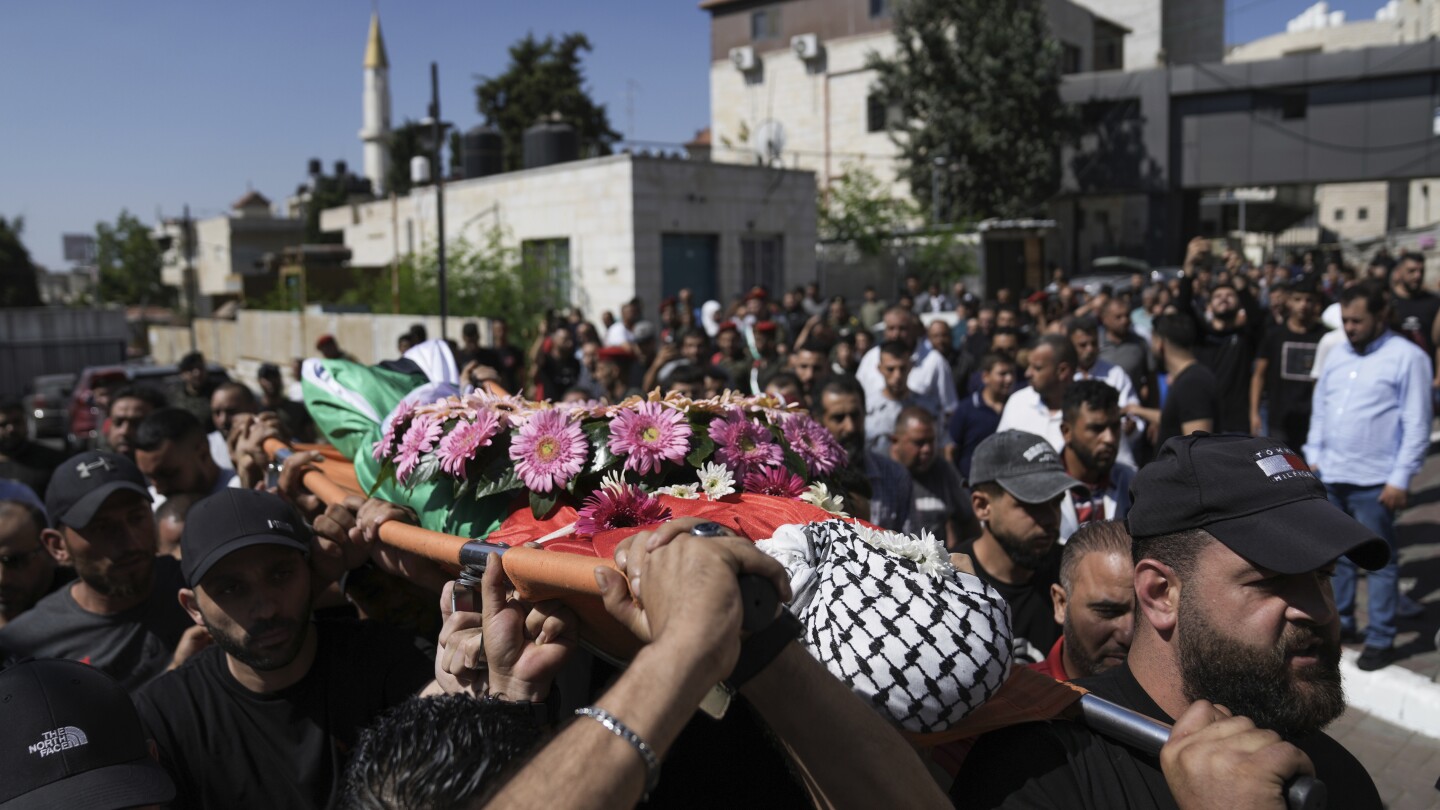 Israel arrests 2 settlers after deadly rampage on a village left one Palestinian dead | AP News