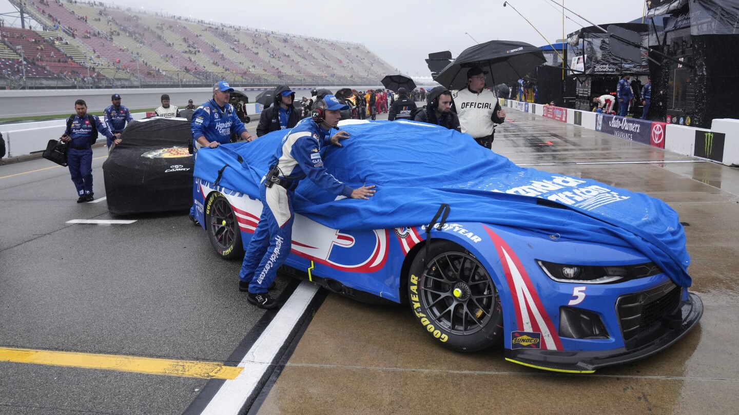 NASCAR suspends race at Michigan due to rain and aims to resume Monday | AP News