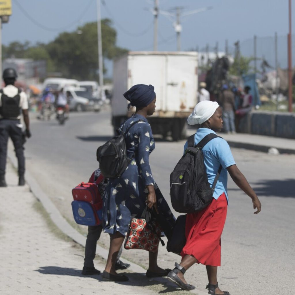 Thousands in Haiti march to demand safety from violent gangs as killings and kidnappings soar | AP News