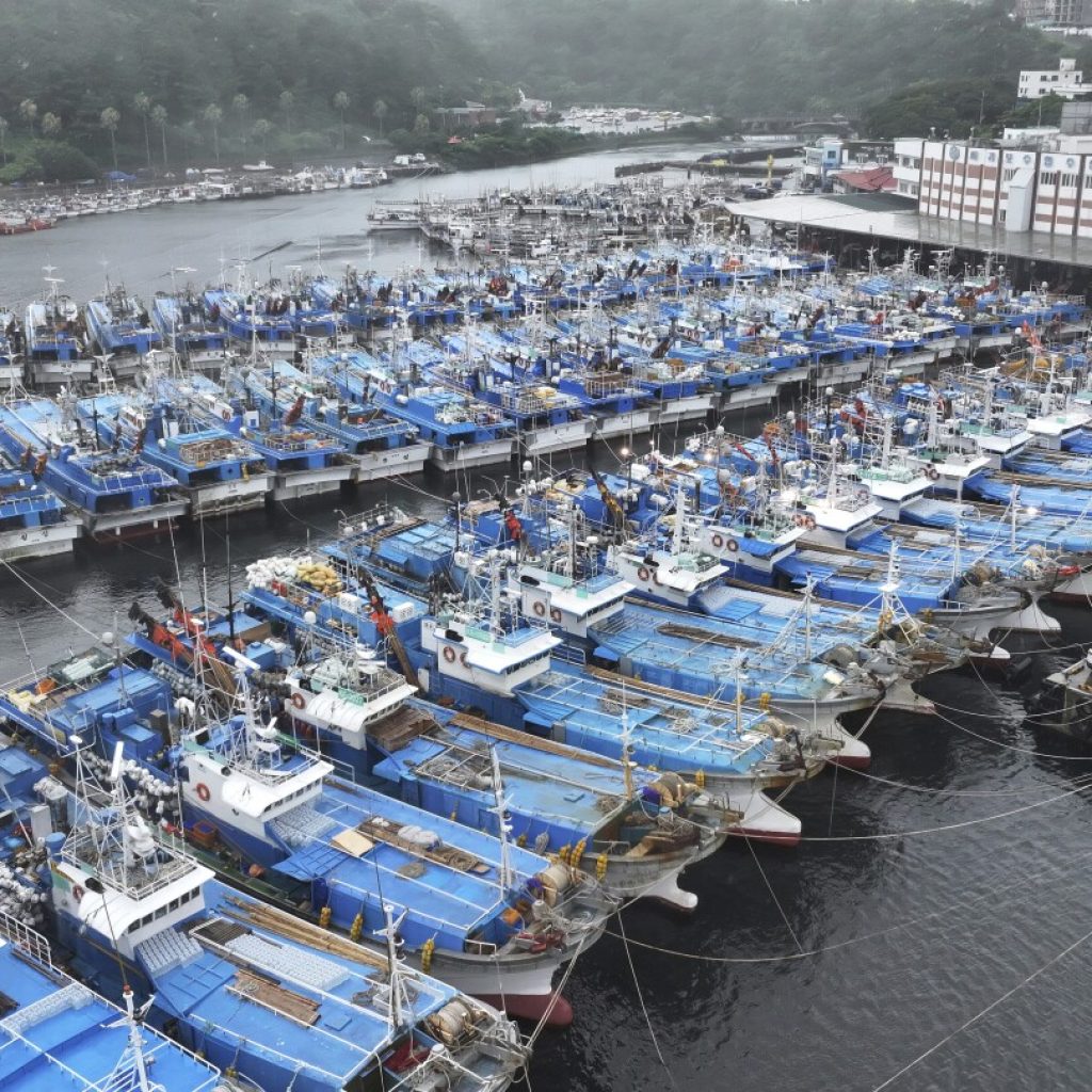 Flights and ferries halted in South Korea ahead of storm that’s dumped rain on Japan for a week | AP News