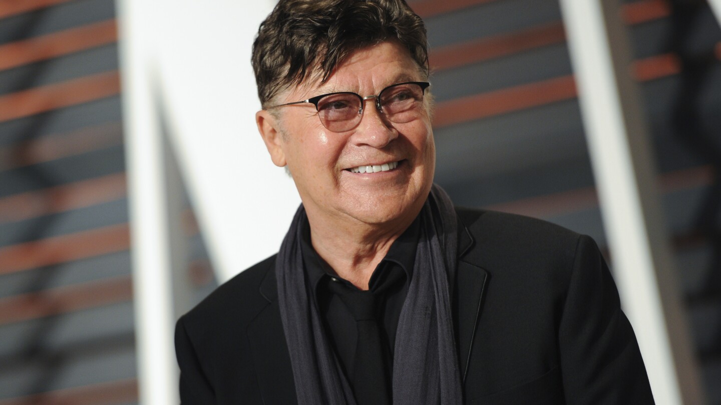 Robbie Robertson, lead guitarist and songwriter of The Band, dies at 80 | AP News