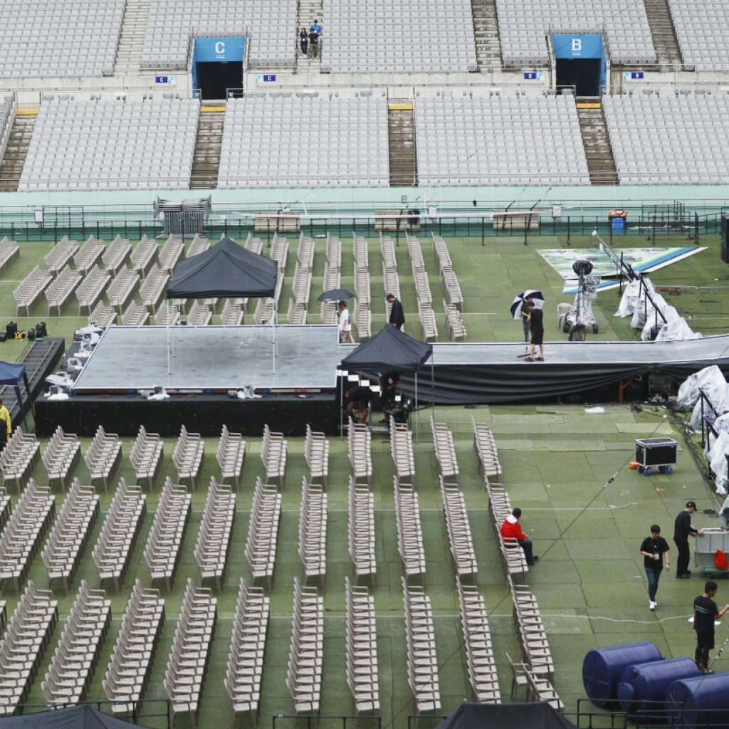 Tropical storm weakens after leaving scattered damage in South Korea, which turns to Scout concert | AP News