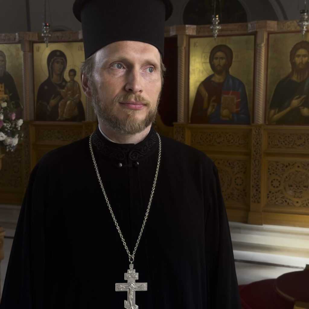 Russian Orthodox priests face persecution from state and church for supporting peace in Ukraine | AP News