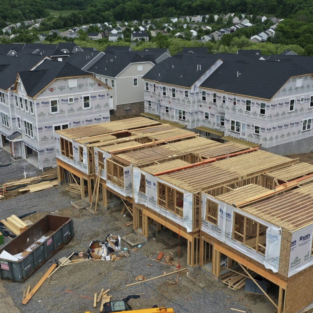 Average long-term US mortgage rate climbs to highest level in more than 20 years | AP News