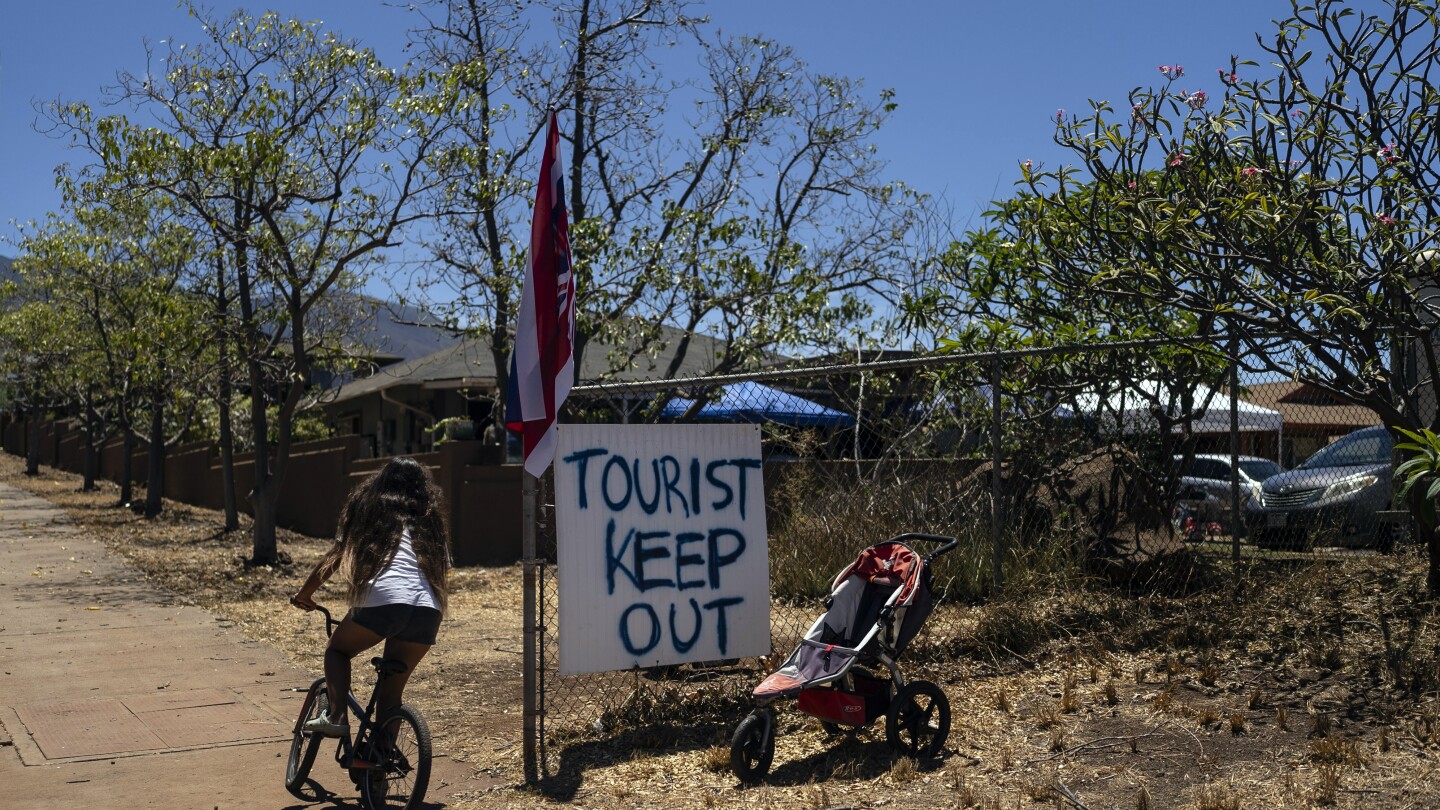 As Maui rebuilds, residents reckon with tourism’s role in their recovery | AP News