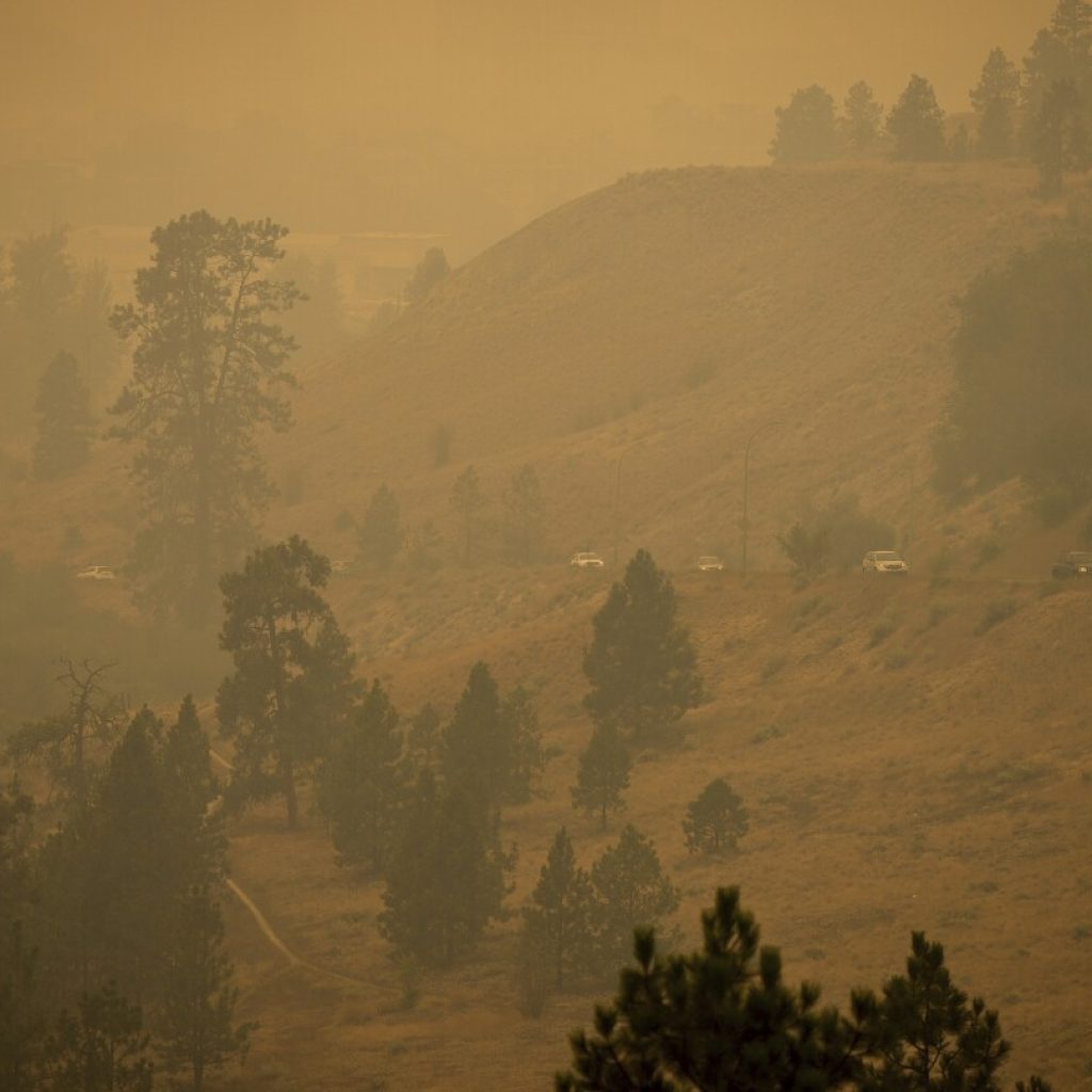 Firefighters curb blazes threatening 2 cities in western Canada but are ‘not out of the woods yet’ | AP News