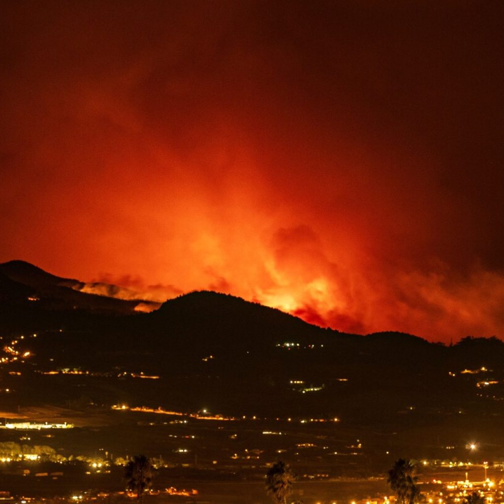 Official says wildfire on Spain’s popular tourist island of Tenerife was started deliberately | AP News