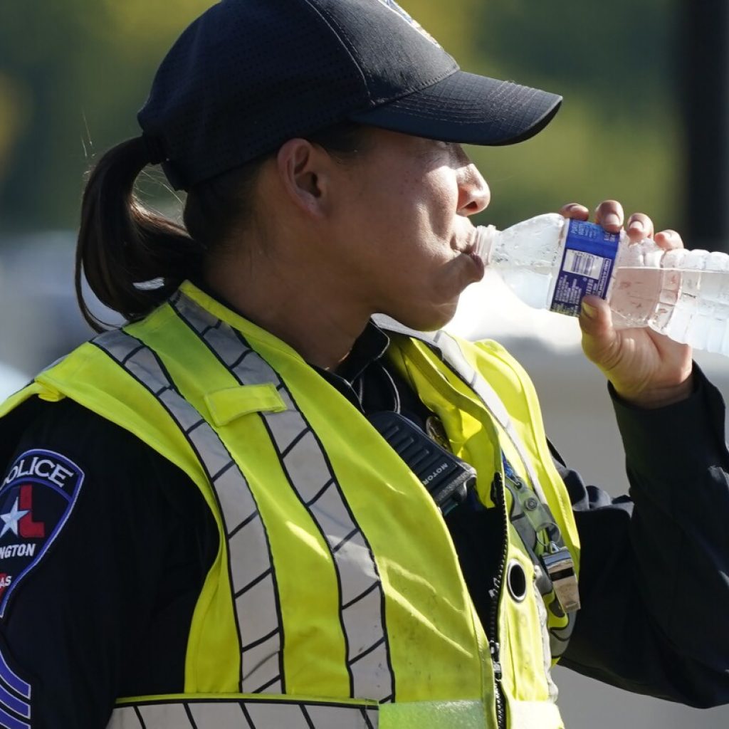 Sweltering temperatures bring misery to large portion of central U.S., setting some heat records | AP News