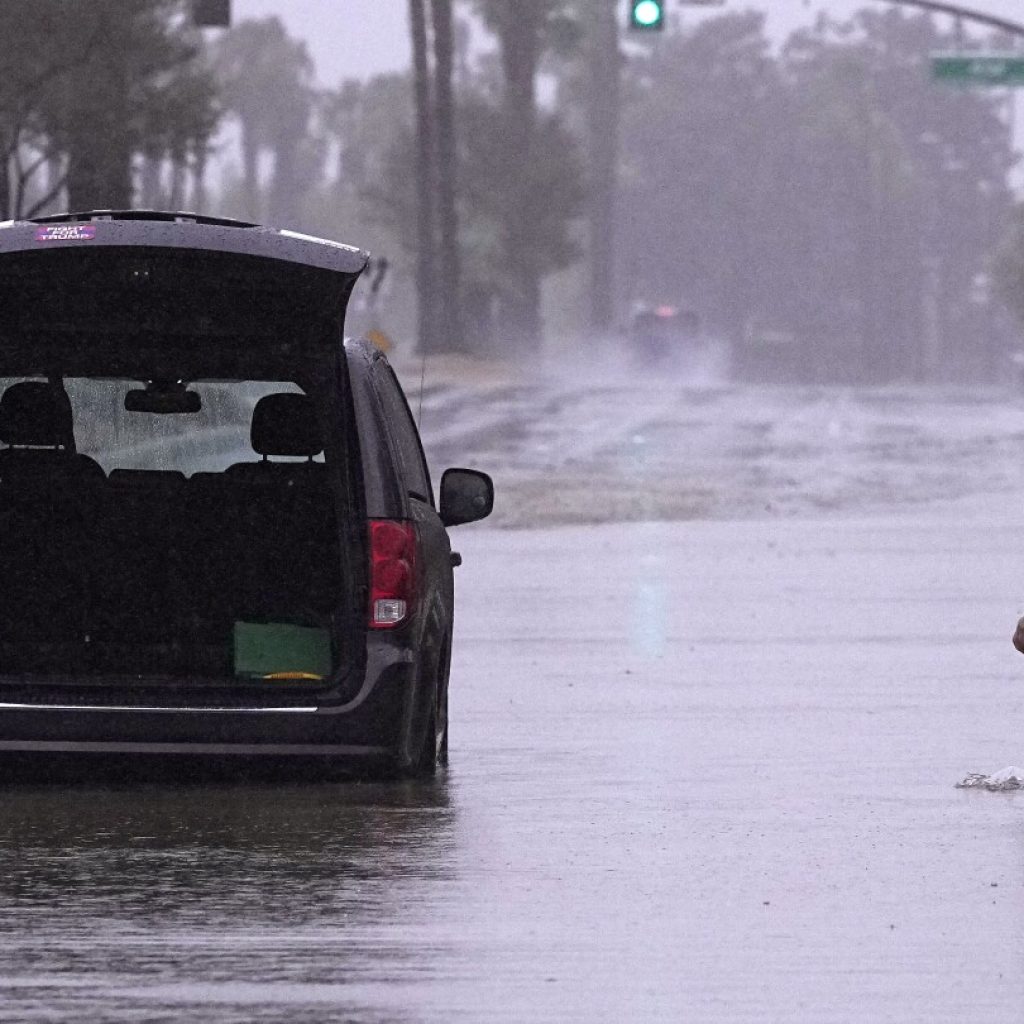 Southern California braces for more floods as tropical storm soaks region from coast to desert | AP News