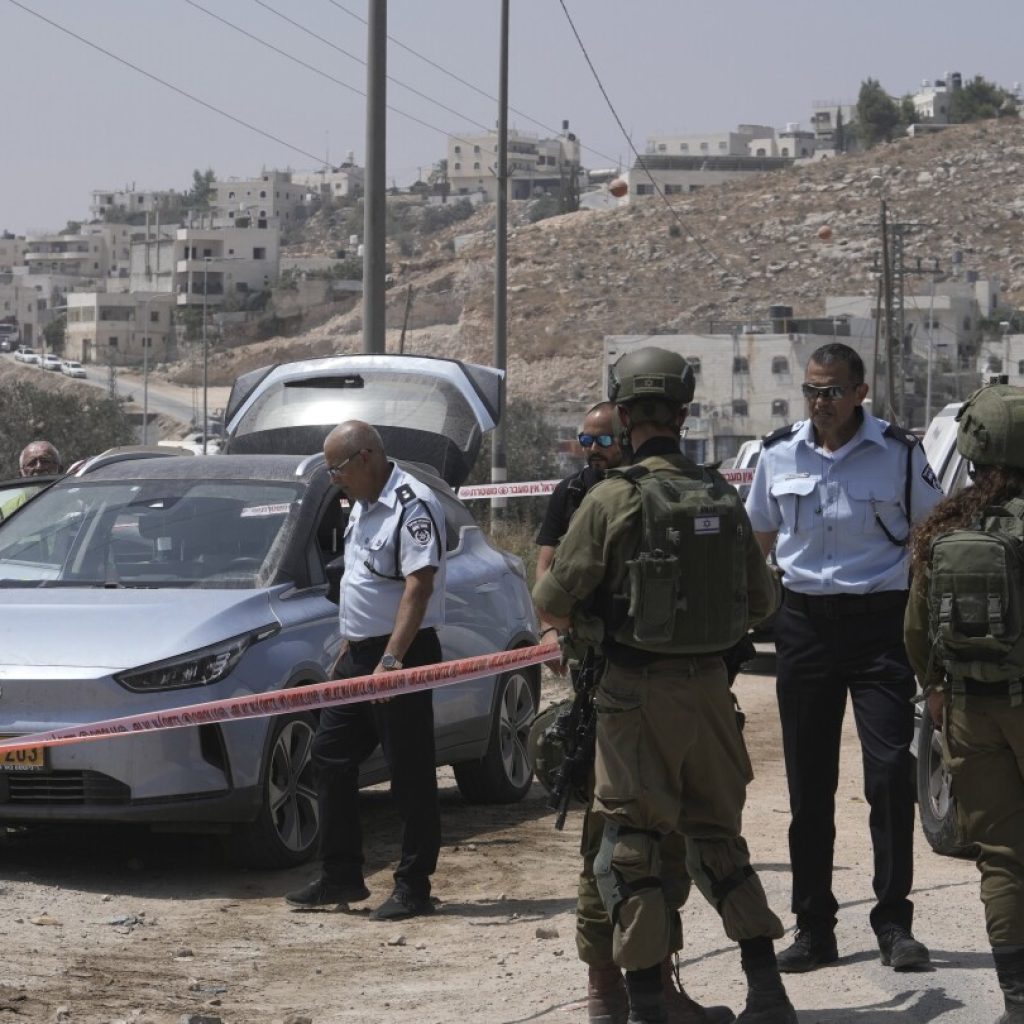 Suspected Palestinian gunman kills an Israeli, wounds another in latest attack in occupied West Bank | AP News