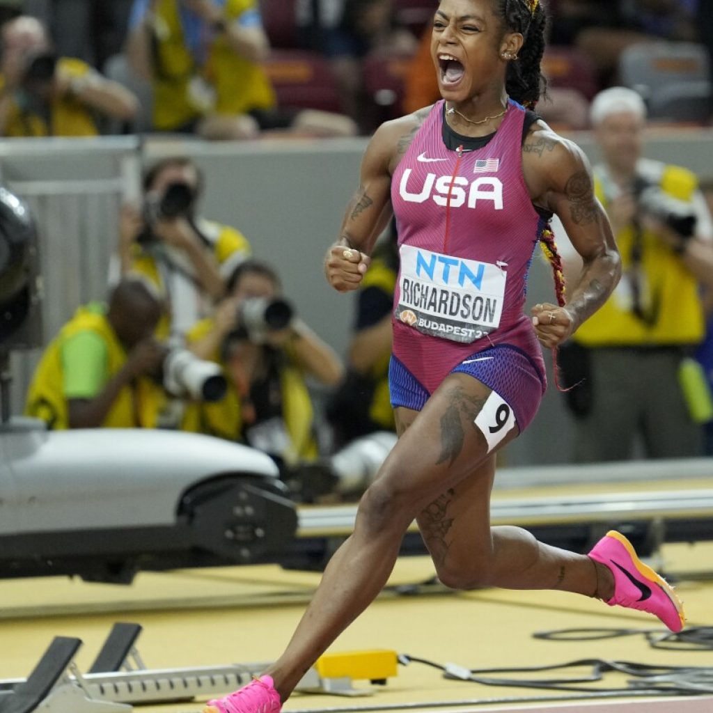 Sha’Carri Richardson caps comeback by winning 100-meter title at worlds | AP News