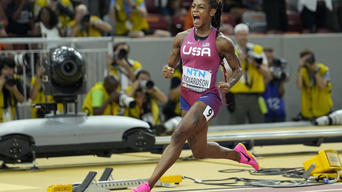 Sha’Carri Richardson caps comeback by winning 100-meter title at worlds | AP News