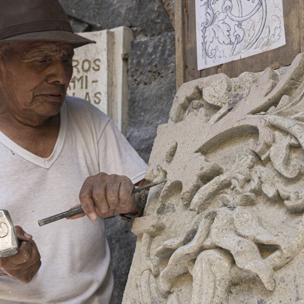 Traditional stone carvers chisel on despite loss of quarries in village swallowed by Mexico City | AP News