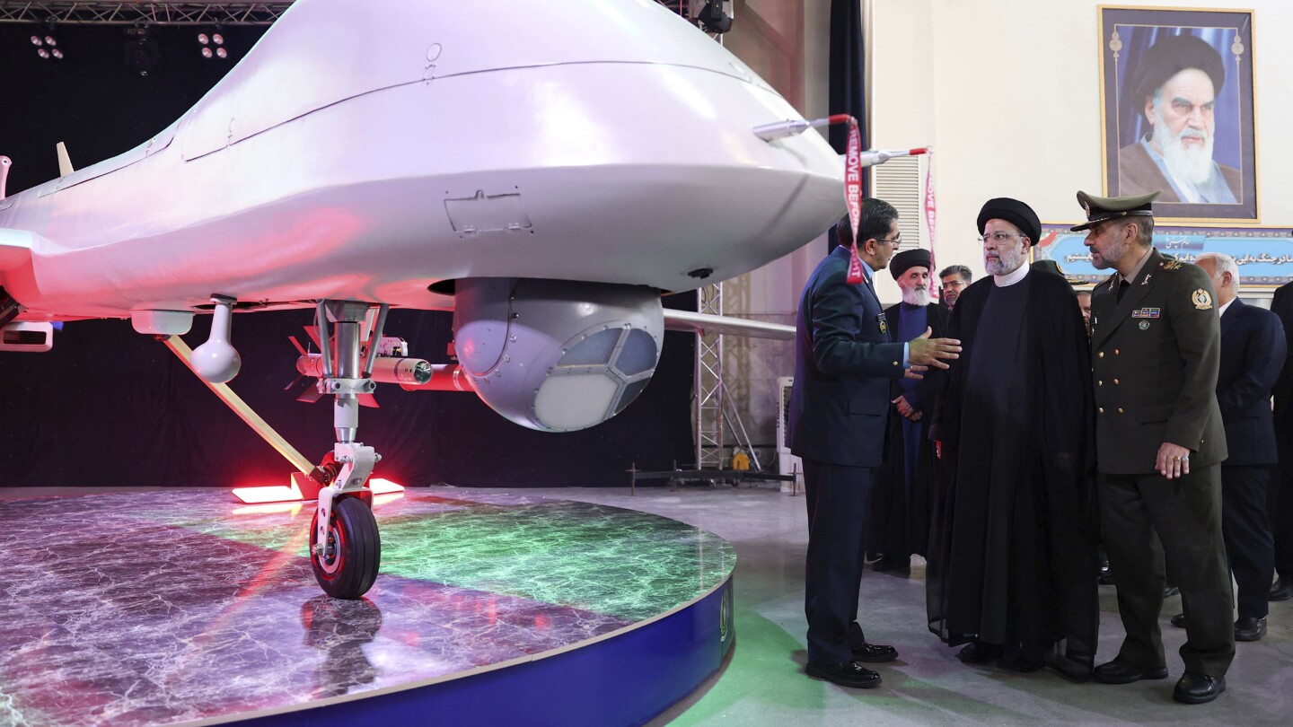 Iran unveils armed drone resembling America’s MQ-9 Reaper and says it could potentially reach Israel | AP News