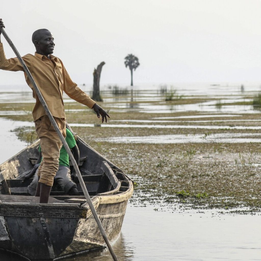 As oil activities encroach on sacred natural sites, a small Ugandan community feels besieged | AP News