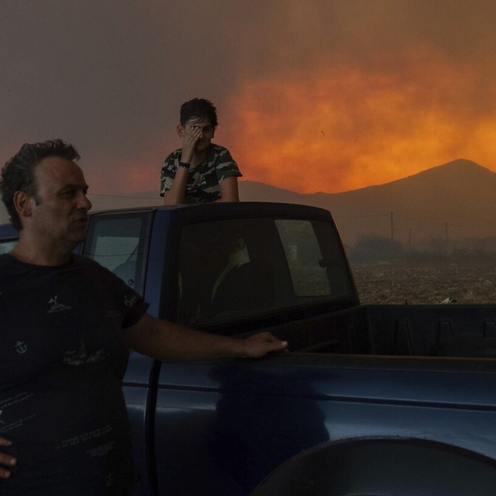 From Europe to Canada to Hawaii, photos capture destructive power of wildfires | AP News