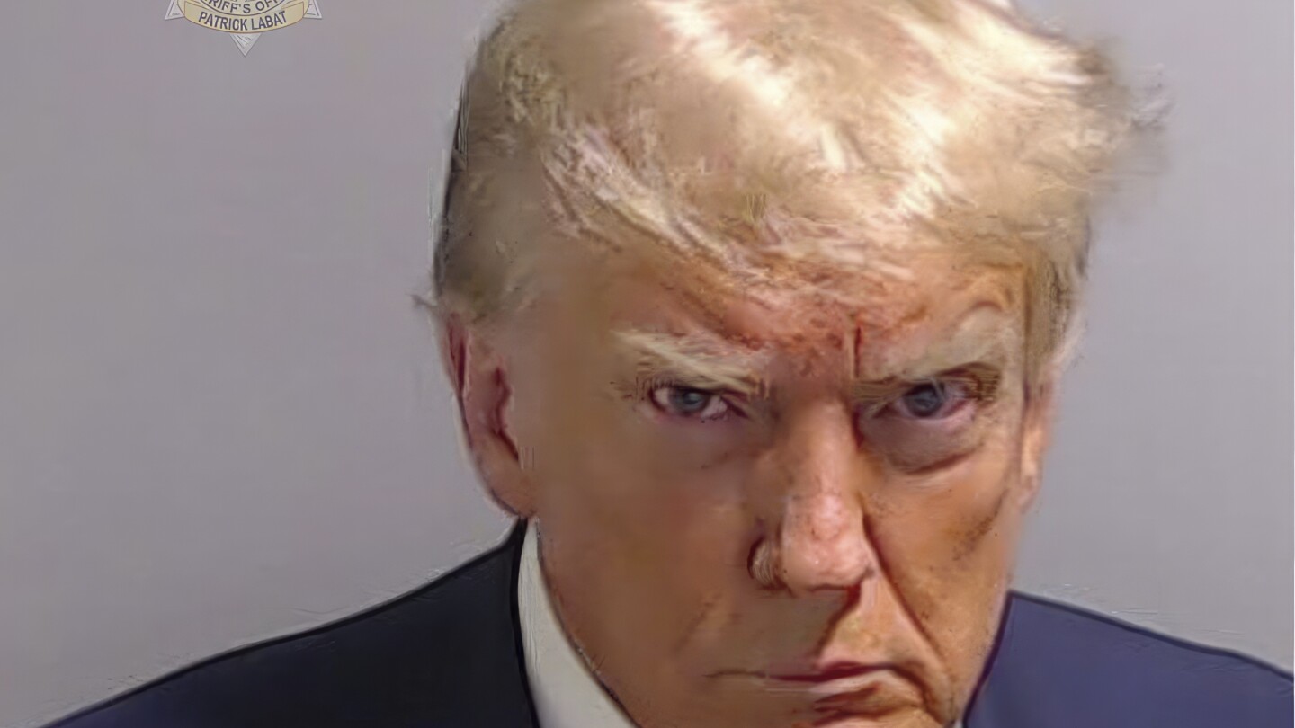 One image, one face, one American moment: The Donald Trump mug shot | AP News