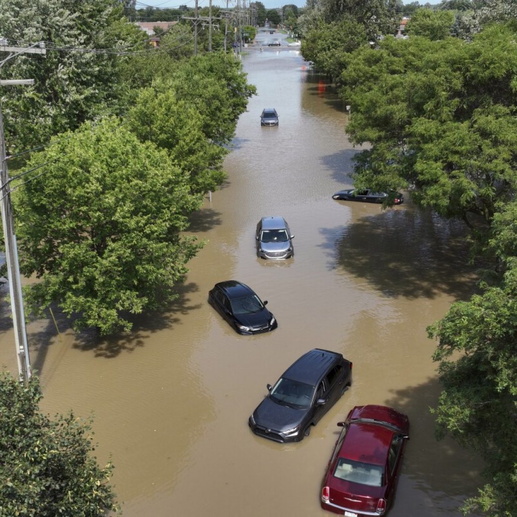 Flooding fills tunnels leading to Detroit airport, forces water rescues in Ohio and Las Vegas | AP News