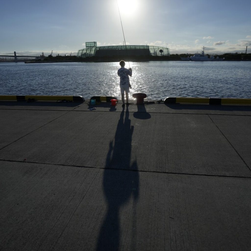 Fukushima residents react cautiously after start of treated water release from wrecked nuclear plant | AP News