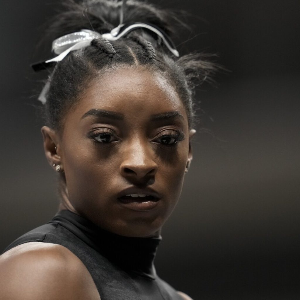 Simone Biles wins a record 8th US Gymnastics title a full decade after her first | AP News