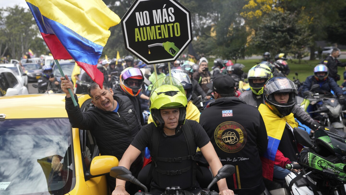 Thousands take to Colombia’s streets to protest 50% increase in gasoline prices | AP News