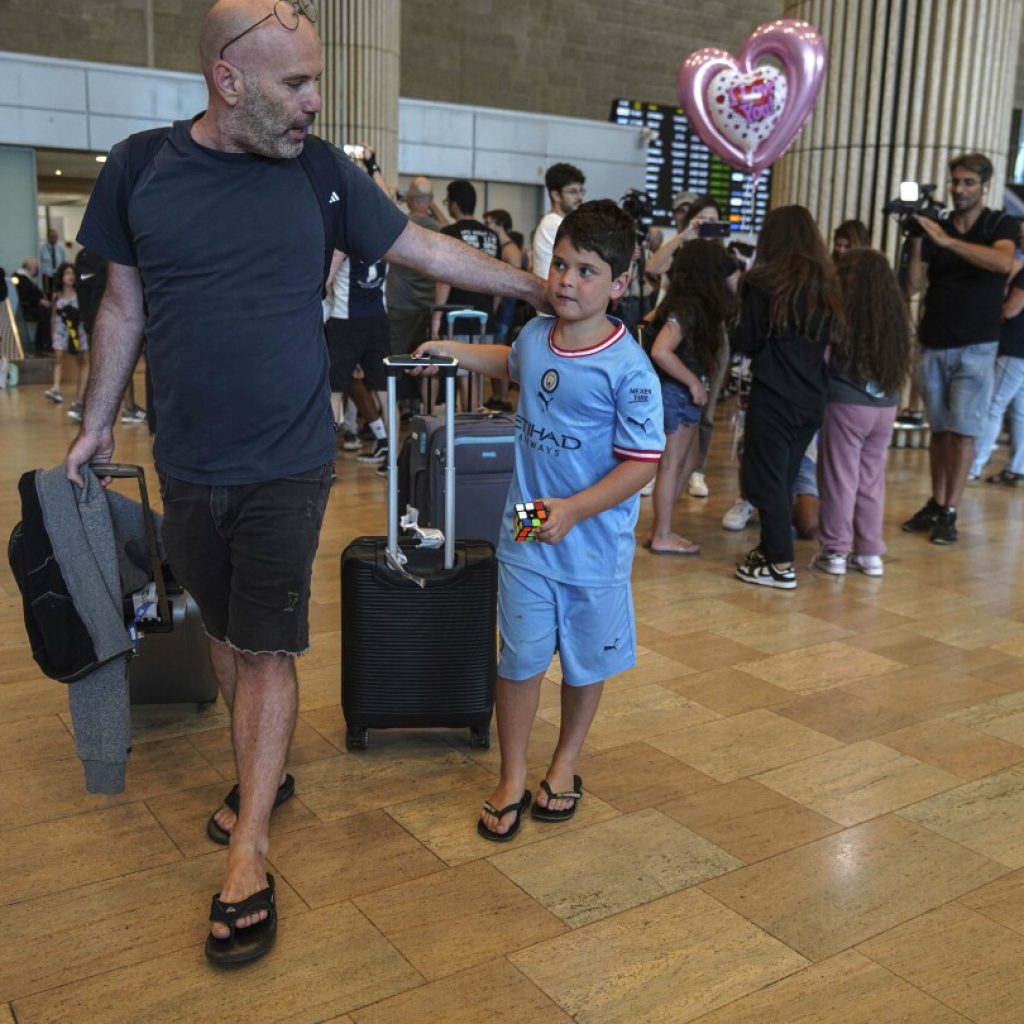 Israelis on a flight that made an emergency landing in Saudi Arabia return to Tel Aviv | AP News