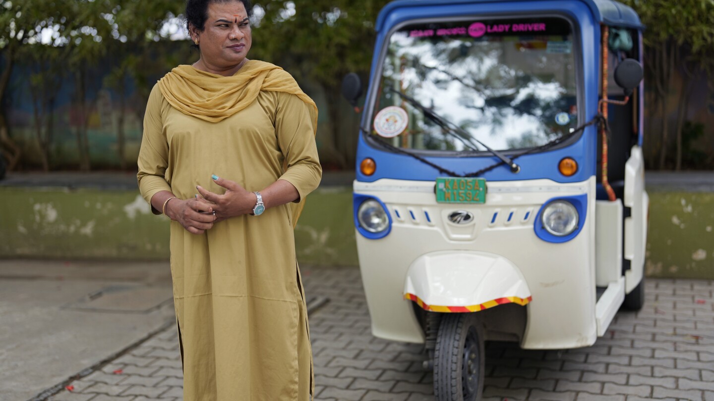 This trans woman was begging on India’s streets. A donated electric rickshaw changed her life | AP News