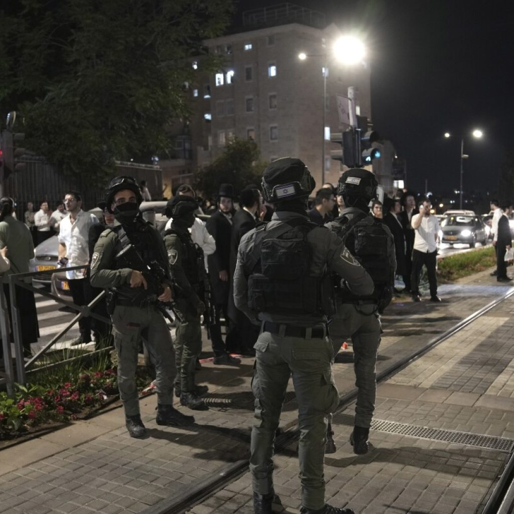 Palestinian driver rams truck into pedestrians at West Bank checkpoint, wounding 3 | AP News